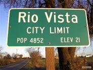 Sign reading Rio Vista City Limit Pop 4852 Elev 21