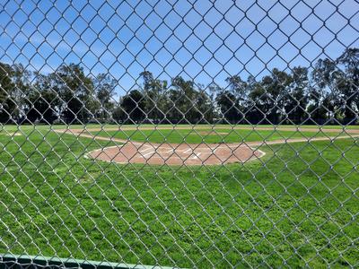 Baseball Field View Through Fence